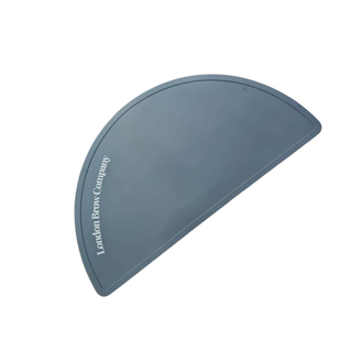 Gray eyebrow shaping tool with 'London Brow Company' branding on a white background