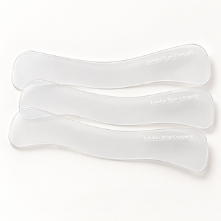 Three clear eyebrow wrap arranged horizontally on a clean white background, each printed with the brand name 'London Brow Company' in white.