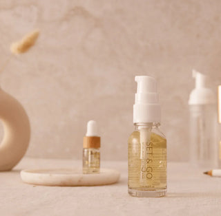 Set & Go skincare bottles on a neutral background from London Brow Company
