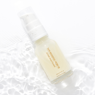 step 3 london brow nourishing serum bottle on a textured white background